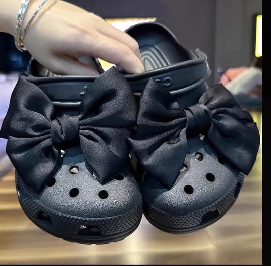 Black bow crocs