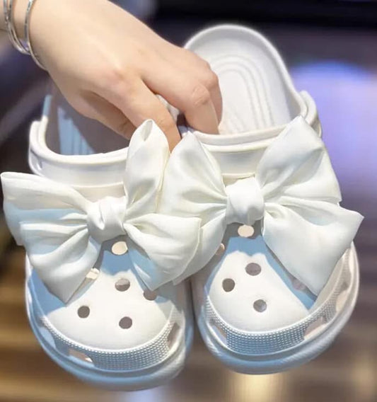 White bow crocs