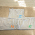 INITAL SUMMER VESTS